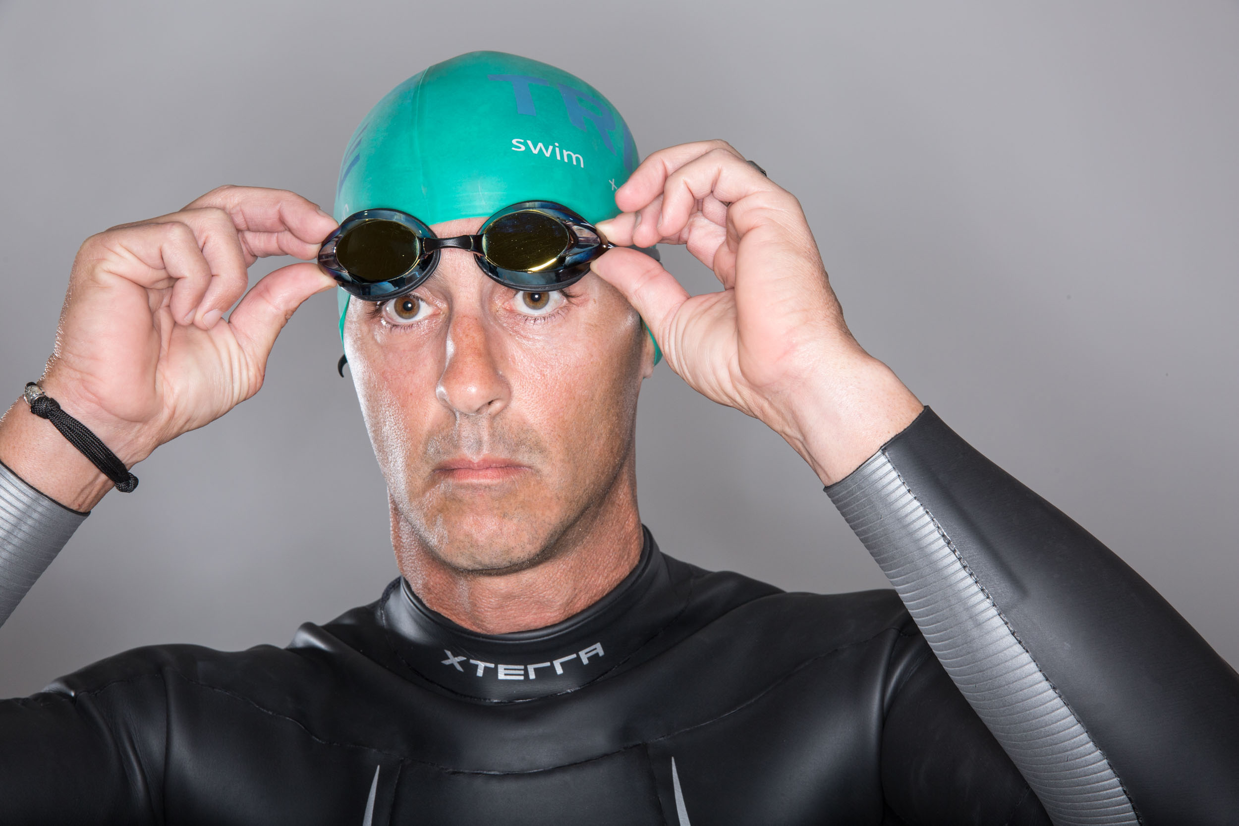 Florida Photography | triathlete adjusting goggles | Steven Martine