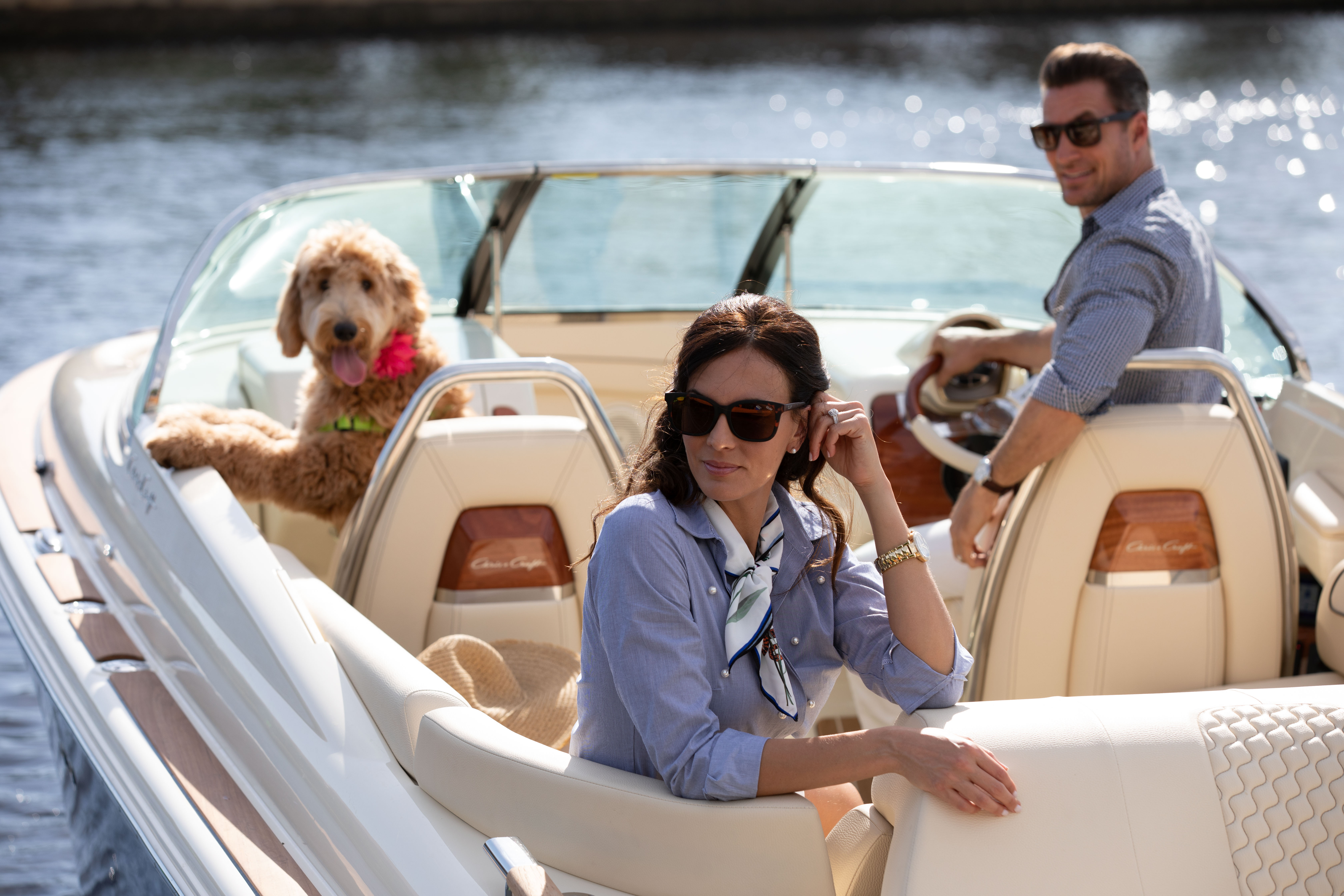 Florida Photography | couple with dog on boat | Steven Martine
